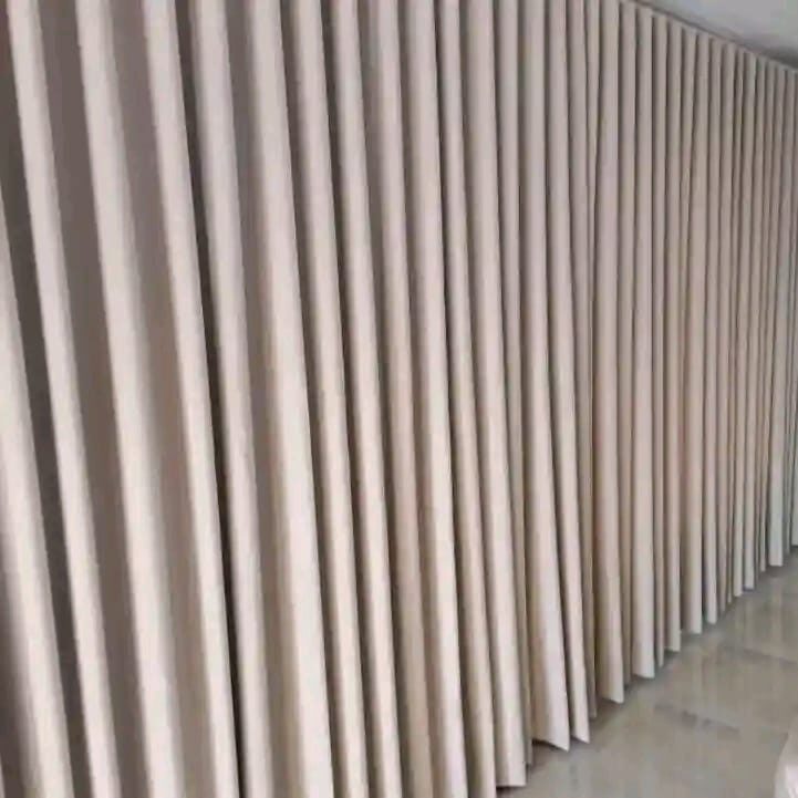 Champagne wave-fold curtains fitted by Chiwondo Home Choice