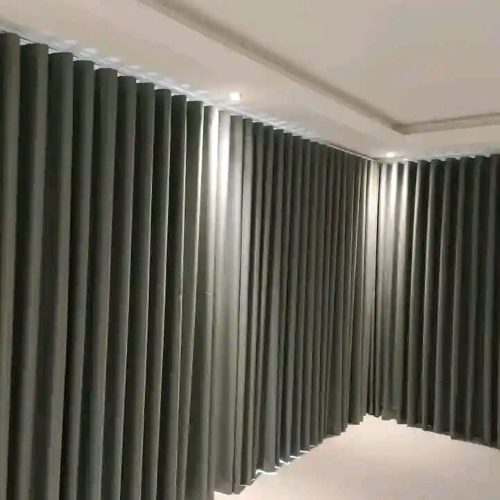 Elegant wave-fold curtains installed by Chiwondo Home Choice in a Pretoria home